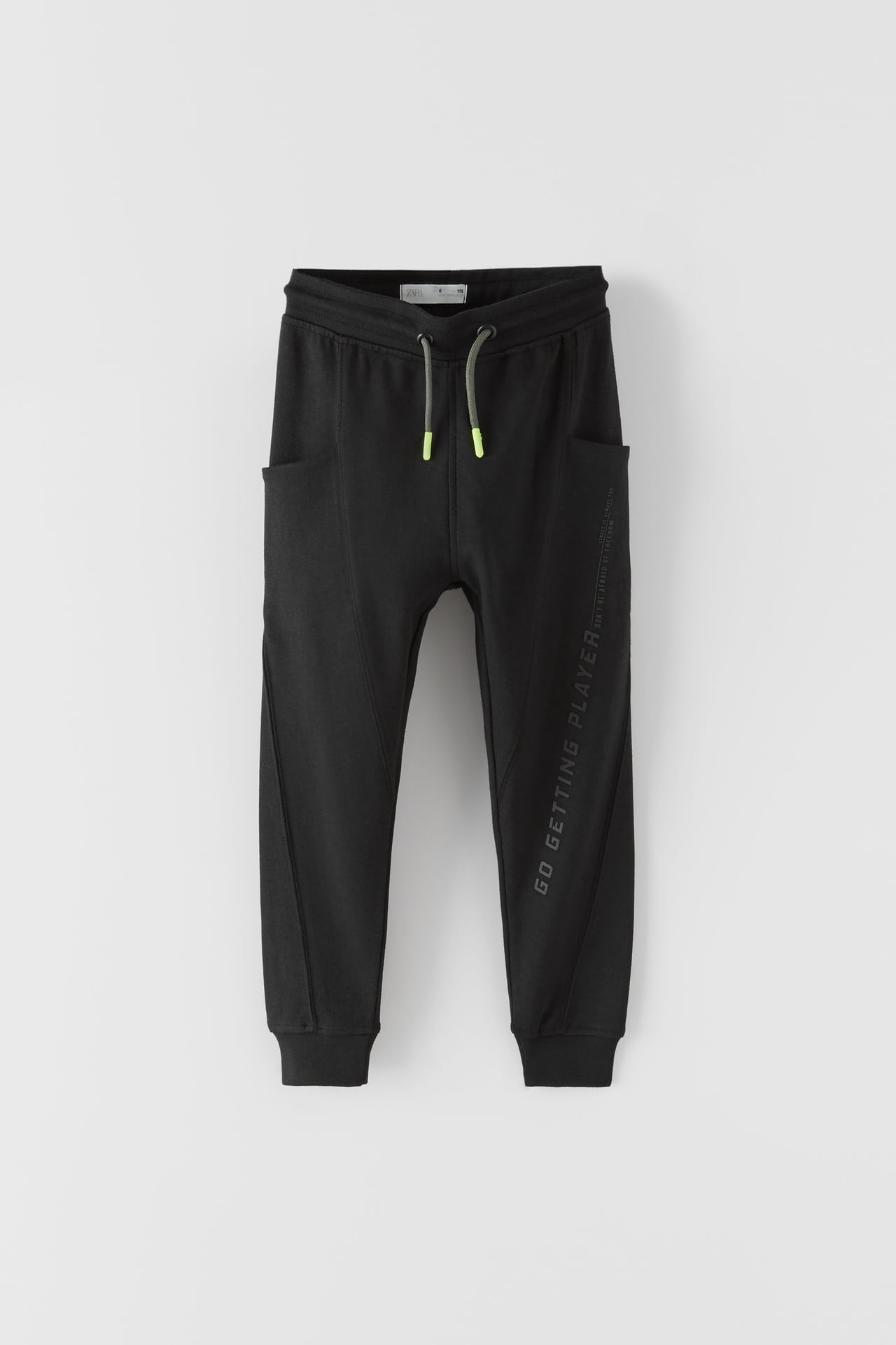 SPORTY TROUSERS WITH NEON DETAIL