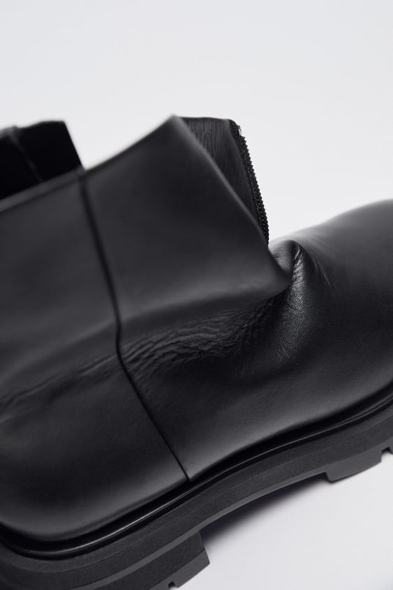 FLAT LEATHER ANKLE BOOTS WITH TRACK SOLES