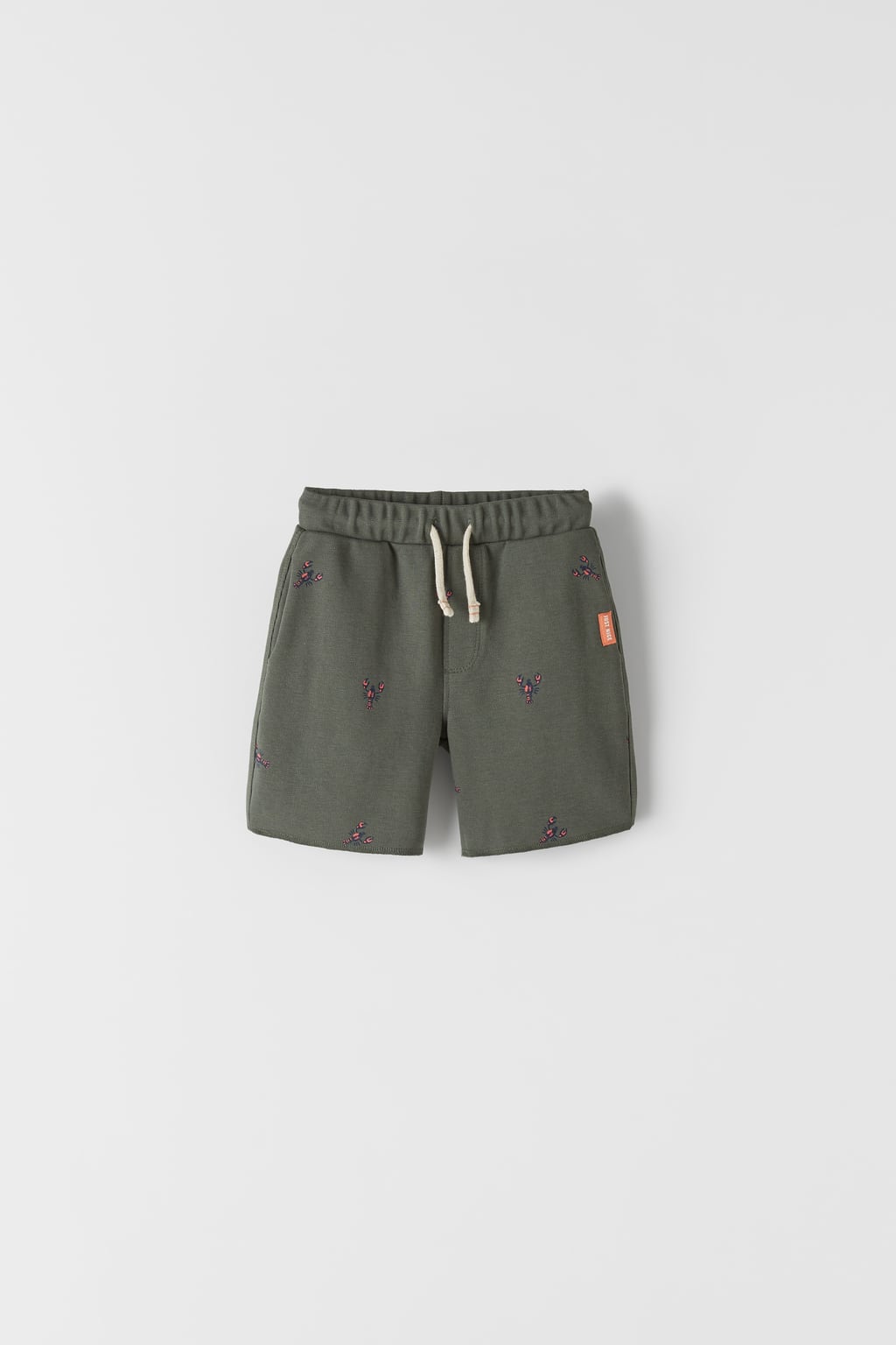 PIQUÉ BERMUDA SHORTS WITH MOTIFS