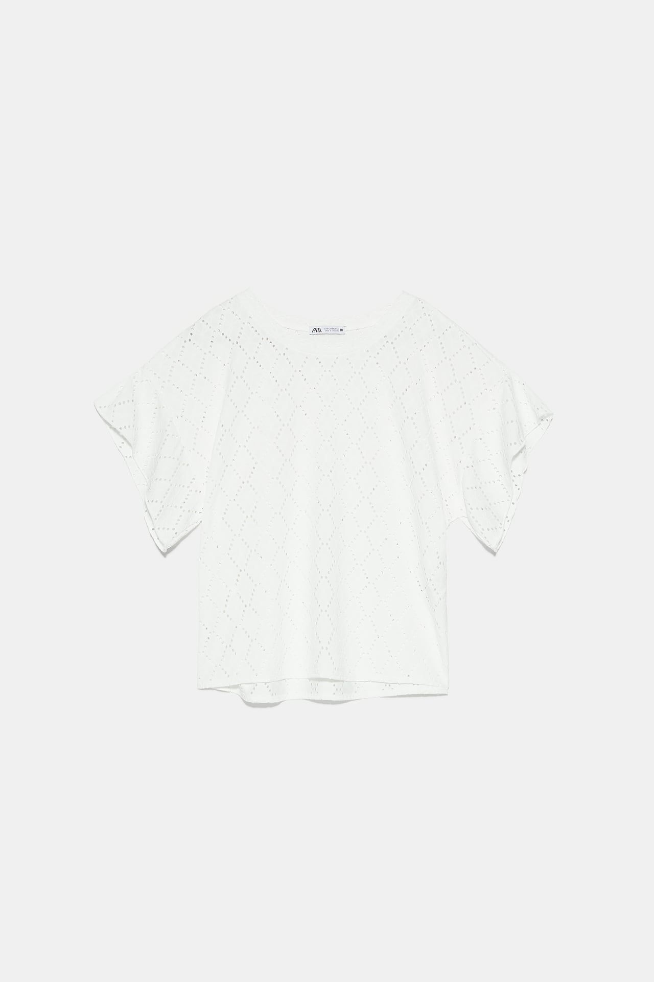 TOP WITH DIE-CUT EMBROIDERY