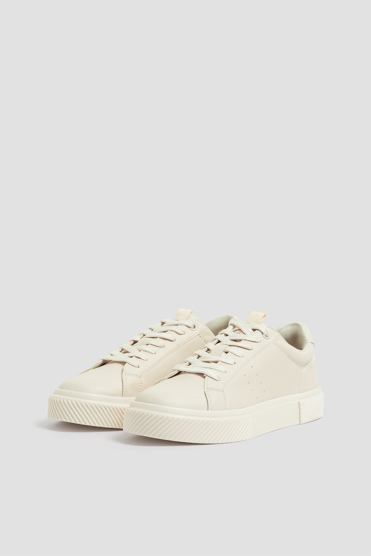 Trainers with pull tab detail