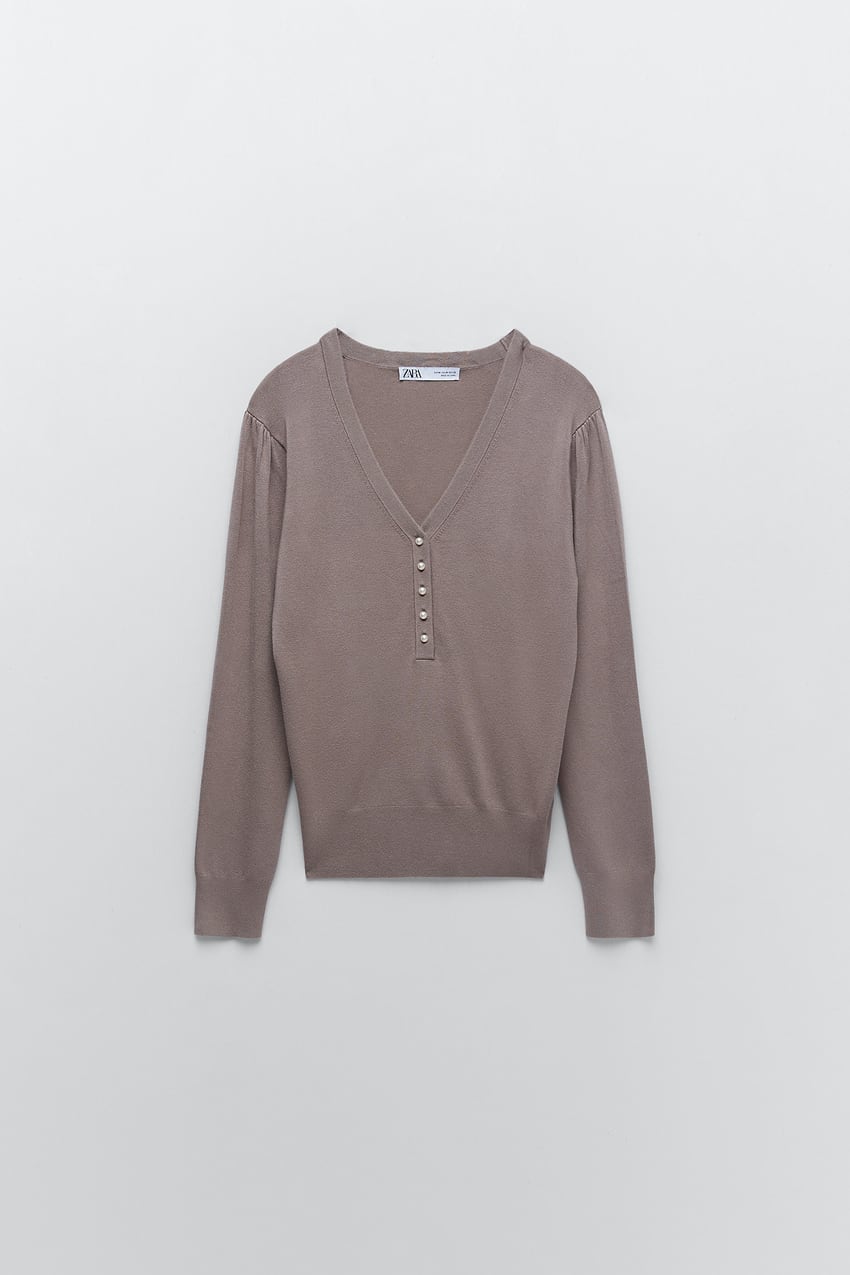 V-NECK SWEATER WITH FAUX PEARLS