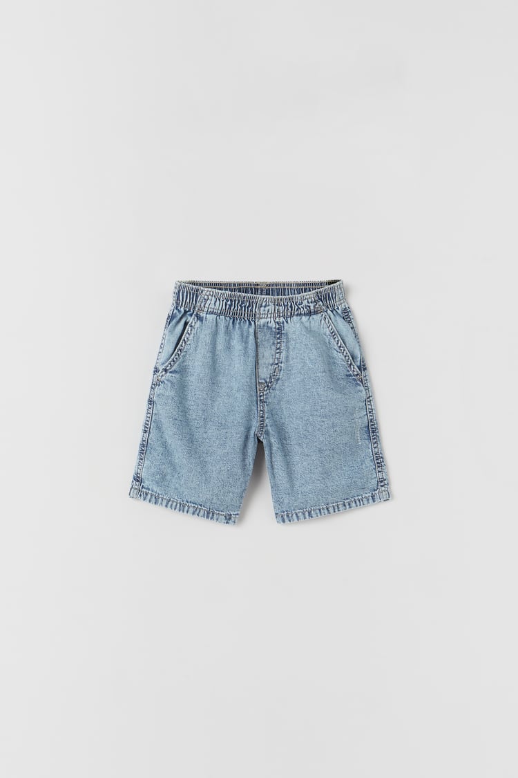 FADED-EFFECT LOOSE-FITTING DENIM BERMUDA SHORTS