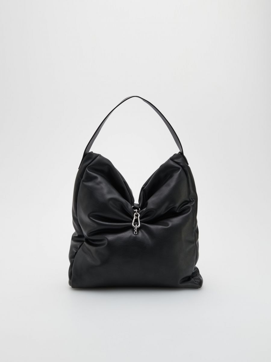 Tasche mit dekorativer Schnalle