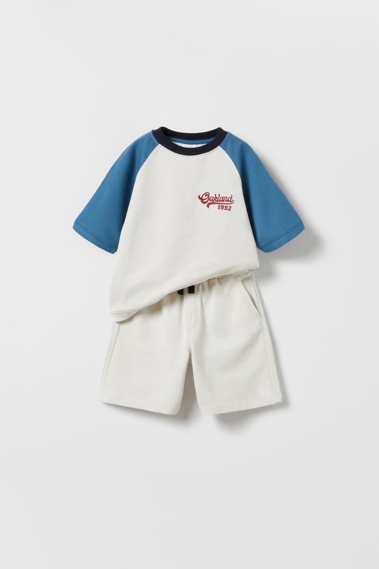 PLUSH SET WITH EMBROIDERED SLOGAN